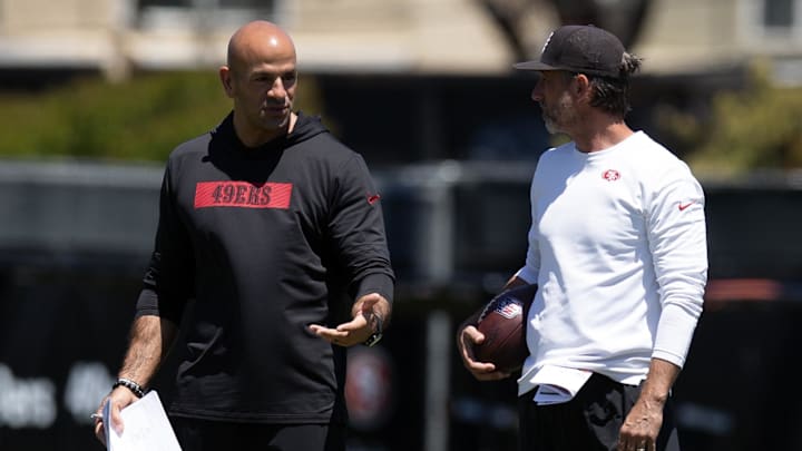 May 9, 2025; Santa Clara, CA, USA; San Francisco 49ers head coach Kyle Shanahan, right, confers with defensive coordinator Robert Saleh during the teamís rookie minicamp. Mandatory Credit: D. Ross Cameron-Imagn Images