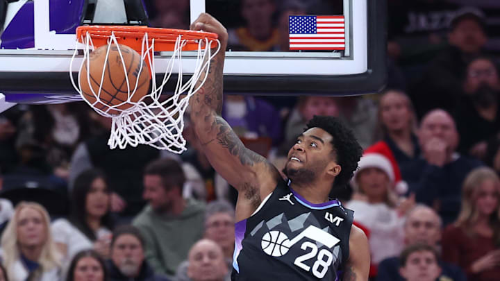 Dec 15, 2025; Salt Lake City, Utah, USA; Utah Jazz forward Brice Sensabaugh (28) dunks the ball against the Dallas Mavericks during the second quarter at Delta Center. Mandatory Credit: Rob Gray-Imagn Images