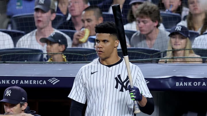 Jun 7, 2024; Bronx, New York, USA; New York Yankees right fielder Juan Soto (22) holds a bat on the top step of the dugout during the seventh inning against the Los Angeles Dodgers at Yankee Stadium. Mandatory Credit: Brad Penner-USA TODAY Sports Jun 7, 2024; Bronx, New York, USA; New York Yankees right fielder Juan Soto (22) holds a bat on the top step of the dugout during the seventh inning against the Los Angeles Dodgers at Yankee Stadium. Mandatory Credit: Brad Penner-USA TODAY Sports