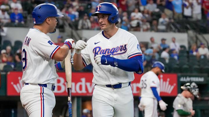 Texas Rangers second baseman Justin Foscue (14) is greeted by third baseman Cody Freeman (39) after hitting a solo home run. Credit: Raymond Carlin III-Imagn Images Texas Rangers second baseman Justin Foscue (14) is greeted by third baseman Cody Freeman (39) after hitting a solo home run. Credit: Raymond Carlin III-Imagn Images