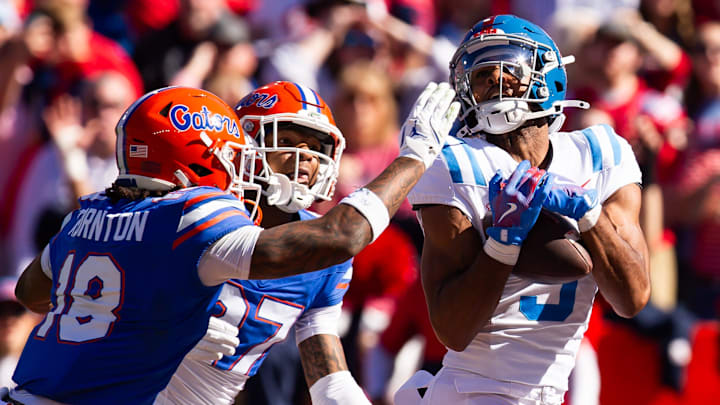 Mississippi Rebels wide receiver Tre Harris (9) hauls in a touchdown pass during the first half at Ben Hill Griffin Stadium in Gainesville, FL on Saturday, November 23, 2024. [Doug Engle/Gainesville Sun]