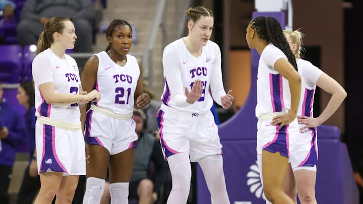 Feb. 11, 2025-TCU players gather after a timeout in a 79-47 win over BYU.