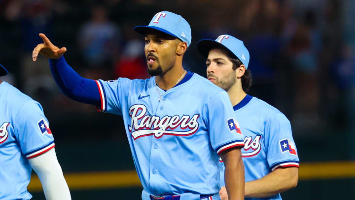 Jun 9, 2024; Arlington, Texas, USA; Texas Rangers second base Marcus Semien (2) celebrates the win against the San Francisco Giants at Globe Life Field. 