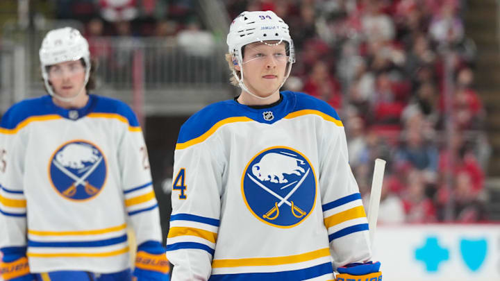 Jan 19, 2026; Raleigh, North Carolina, USA;  Buffalo Sabres center Konsta Helenius (94) loos on against the Carolina Hurricanes during the second period at Lenovo Center. Mandatory Credit: James Guillory-Imagn Images