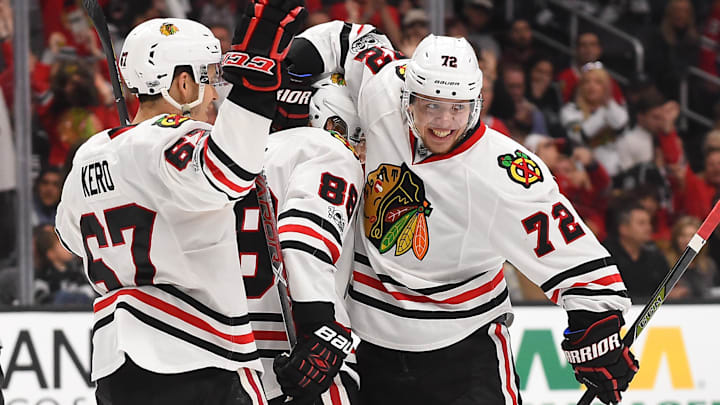 Apr 8, 2017; Los Angeles, CA, USA; Chicago Blackhawks left wing Artemi Panarin (72), right wing Patrick Kane (88) and center Tanner Kero (67) celebrate a goal in the third period of the game against the Los Angeles Kings at Staples Center. Kings won 3-2 in overtime. Mandatory Credit: Jayne Kamin-Oncea-Imagn Images