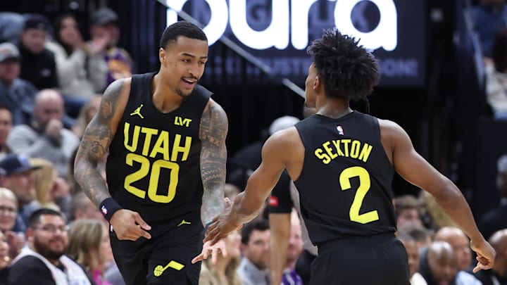 Mar 15, 2024; Salt Lake City, Utah, USA; Utah Jazz forward John Collins (20) and guard Collin Sexton (2) react to a play against the Atlanta Hawks during the first quarter at Delta Center. Mandatory Credit: Rob Gray-Imagn Images