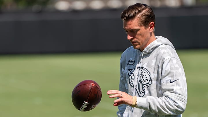 Jacksonville Jaguars general manager James Gladstone bounces the ball off the field after the Jacksonville Jaguars’ third mandatory minicamp Thursday June 12, 2025 at the Miller Electric Center in Jacksonville, Fla. [Doug Engle/Florida Times-Union]