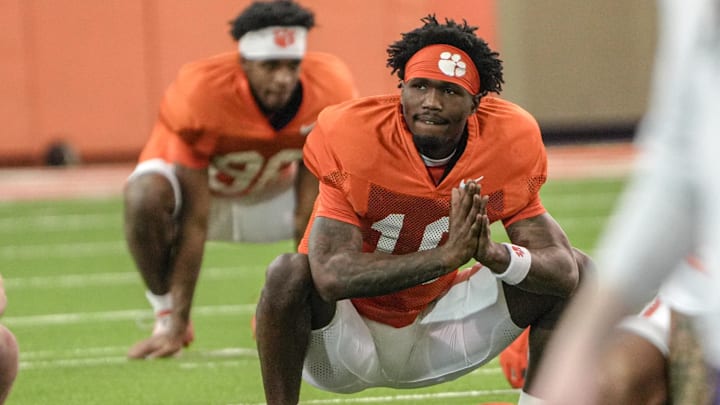 Clemson running back Chris Johnson Jr (16) stretches during Spring football practice at the Reeves Football Complex in Clemson, SC Wednesday, March 4, 2026.