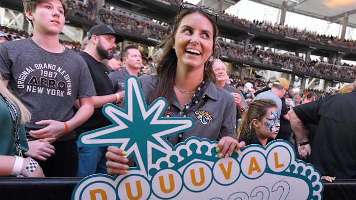 Kari Troia, an event coordinator for the Jacksonville Jaguars with her Draft 2022 sign at Thursday evening's draft party. Jacksonville Jaguar fans showed up at Daily's Place for the 2022 NFL Draft party which saw the Jaguars pick University of Georgia edge rusher Travon Walker as their first pick of the draft where the team had the first overall draft pick Thursday evening, April 28, 2022.