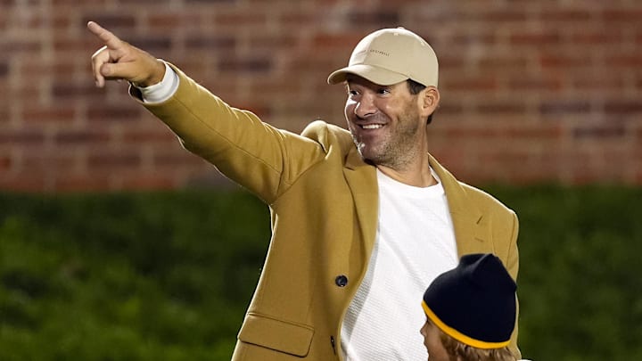 Former Dallas Cowboys quarterback Tony Romo acknowledges the crowd.