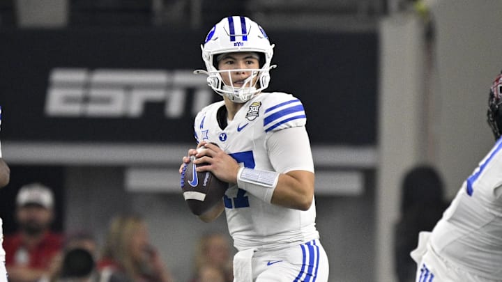Dec 6, 2025; Arlington, TX, USA; BYU Cougars quarterback Bear Bachmeier (47) looks to pass against the Texas Tech Red Raiders during the first half at AT&T Stadium. Mandatory Credit: Jerome Miron-Imagn Images Dec 6, 2025; Arlington, TX, USA; BYU Cougars quarterback Bear Bachmeier (47) looks to pass against the Texas Tech Red Raiders during the first half at AT&T Stadium. Mandatory Credit: Jerome Miron-Imagn Images