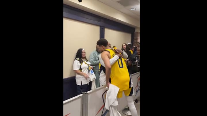 Tyrese Haliburton and John Haliburton embrace on June 5, 2025.