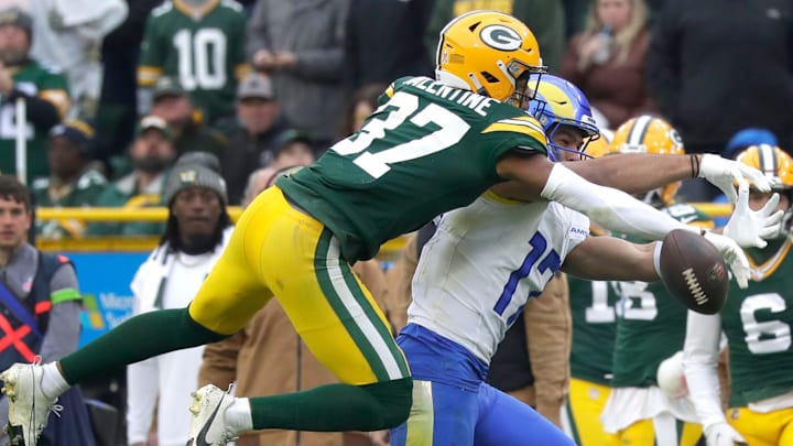 Green Bay Packers cornerback Carrington Valentine (37) breaks up apass to Los Angeles Rams wide