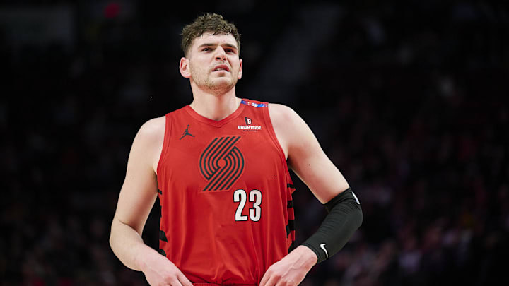Feb 6, 2025; Portland, Oregon, USA; Portland Trail Blazers center Donovan Clingan (23) walks out to the court after a break during the first half against the Sacramento Kings at Moda Center. Mandatory Credit: Troy Wayrynen-Imagn Images