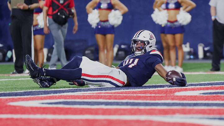 Sep 5, 2026; Tucson, Arizona, USA;  Arizona Wildcats running back Antwan Roberts Jr. (44) scores a touchdown during the third quarter of the game against the Northern Arizona Lumberjacks at Casino Del Sol Stadium. 
