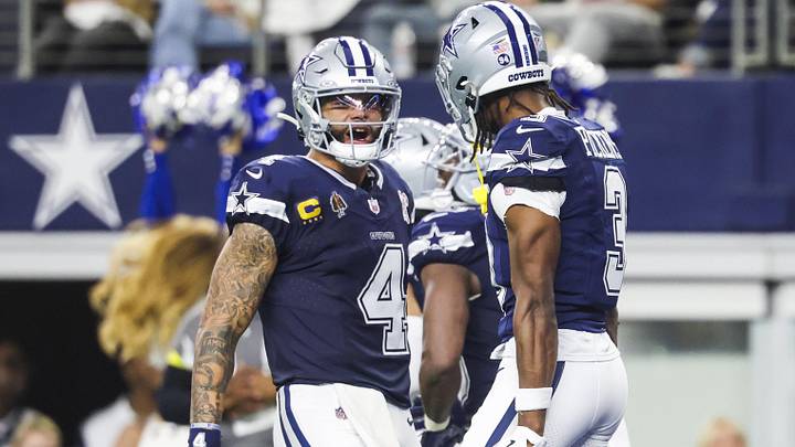 Dallas Cowboys quarterback Dak Prescott celebrates with wide receiver George Pickens following a touchdown pass caught by Pickens during the second quarter at AT&T Stadium. Dallas Cowboys quarterback Dak Prescott celebrates with wide receiver George Pickens following a touchdown pass caught by Pickens during the second quarter at AT&T Stadium.