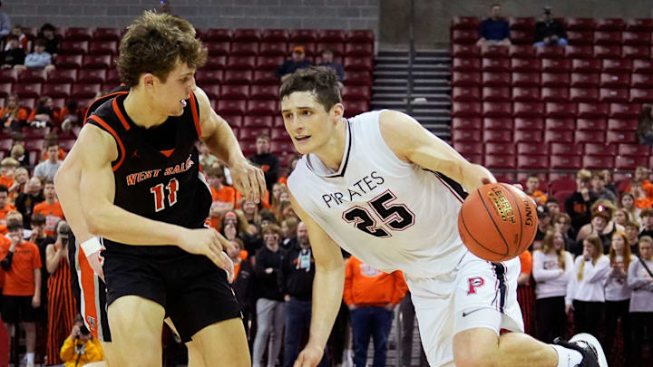 Pewaukee's Nick Janowski (25) drives the ball up the court as he is guarded by West Salem's Carter Pontius (11) during the second half of the WIAA Division 2 boys basketball state semifinal game on Friday March 15, 2024 at the Kohl Center in Madison, Wis. Pewaukee's Nick Janowski (25) drives the ball up the court as he is guarded by West Salem's Carter Pontius (11) during the second half of the WIAA Division 2 boys basketball state semifinal game on Friday March 15, 2024 at the Kohl Center in Madison, Wis.