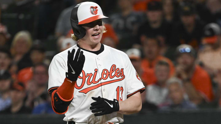 May 1, 2024; Baltimore, Maryland, USA; Baltimore Orioles outfielder Heston Kjerstad (13) reacts after being hit with a eighth inning pitch against the New York Yankees at Oriole Park at Camden Yards. May 1, 2024; Baltimore, Maryland, USA; Baltimore Orioles outfielder Heston Kjerstad (13) reacts after being hit with a eighth inning pitch against the New York Yankees at Oriole Park at Camden Yards.