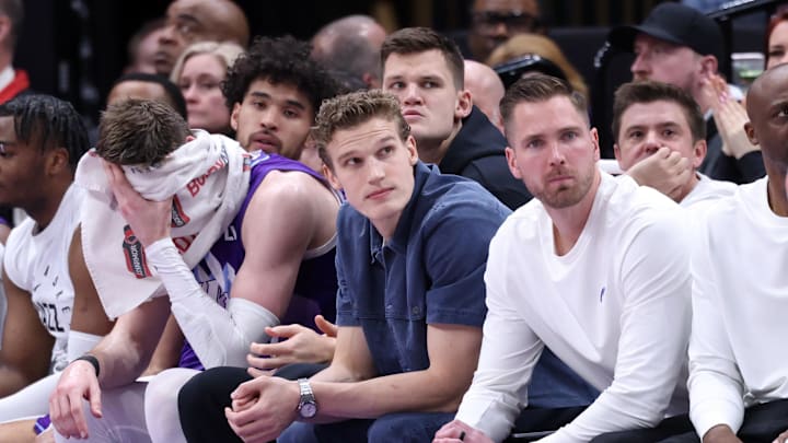 Mar 2, 2025; Salt Lake City, Utah, USA; Utah Jazz forward Lauri Markkanen (center) looks on from the bench during the second half of the game against the New Orleans Pelicans at Delta Center. Mandatory Credit: Rob Gray-Imagn Images