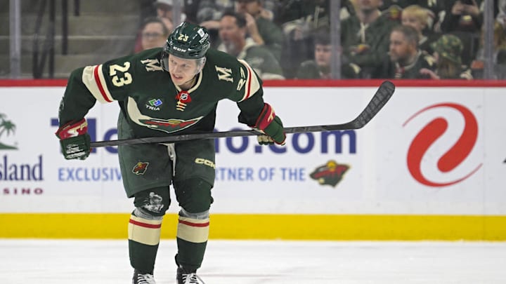Mar 19, 2025; Saint Paul, Minnesota, USA; Minnesota Wild forward Marco Rossi (23) heads to the bench after sustaining an injury against the Seattle Kraken during the first period at Xcel Energy Center. Mandatory Credit: Nick Wosika-Imagn Images Mar 19, 2025; Saint Paul, Minnesota, USA; Minnesota Wild forward Marco Rossi (23) heads to the bench after sustaining an injury against the Seattle Kraken during the first period at Xcel Energy Center. Mandatory Credit: Nick Wosika-Imagn Images