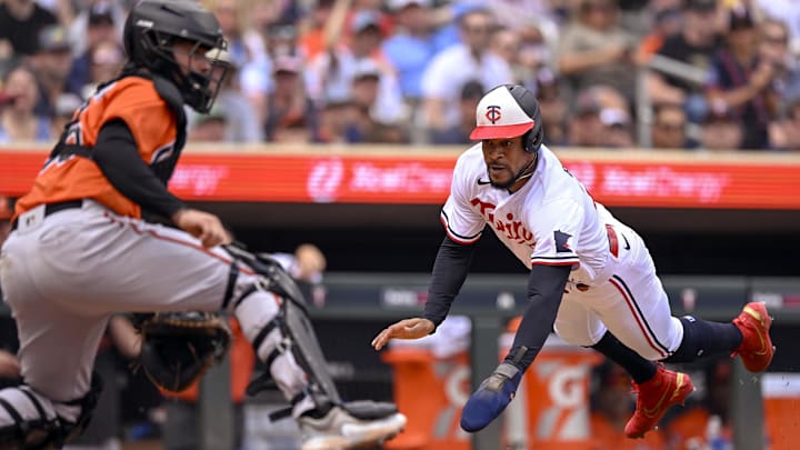 Jul 8, 2023; Minneapolis, Minnesota, USA; Minnesota Twins designated hitter Byron Buxton (25) dives for the plate and scores a run against the Baltimore Orioles during the sixth inning at Target Field. Jul 8, 2023; Minneapolis, Minnesota, USA; Minnesota Twins designated hitter Byron Buxton (25) dives for the plate and scores a run against the Baltimore Orioles during the sixth inning at Target Field.