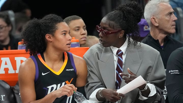 Phoenix Mercury forward Satou Sabally (0) talks with injured guard Kahleah Copper during the third quarter against the Washington Mystics at PHX Arena on May 25, 2025.
