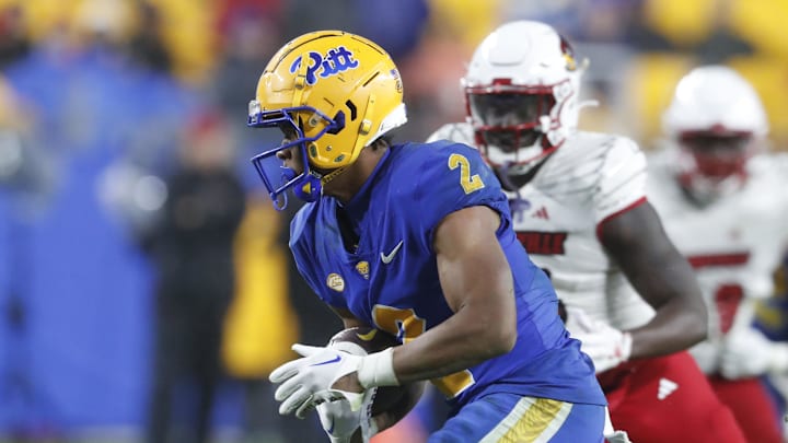Oct 14, 2023; Pittsburgh, Pennsylvania, USA; Pittsburgh Panthers wide receiver Kenny Johnson (2) runs after a catch against the Louisville Cardinals during the third quarter at Acrisure Stadium. Pittsburgh won 38-21. Mandatory Credit: Charles LeClaire-Imagn Images Oct 14, 2023; Pittsburgh, Pennsylvania, USA; Pittsburgh Panthers wide receiver Kenny Johnson (2) runs after a catch against the Louisville Cardinals during the third quarter at Acrisure Stadium. Pittsburgh won 38-21. Mandatory Credit: Charles LeClaire-Imagn Images
