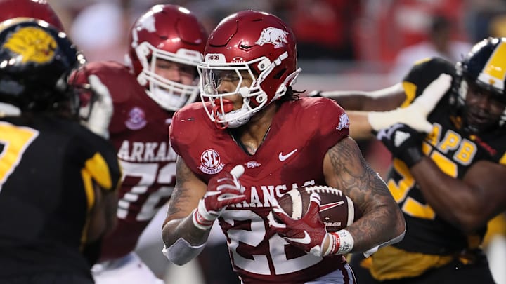 Aug 29, 2024; Little Rock, Arkansas, USA; Arkansas Razorbacks running back Ja’Quinden Jackson (22) rushes during the second quarter against the Pine Bluff Golden Lions at War Memorial Stadium. Mandatory Credit: Nelson Chenault-Imagn Images