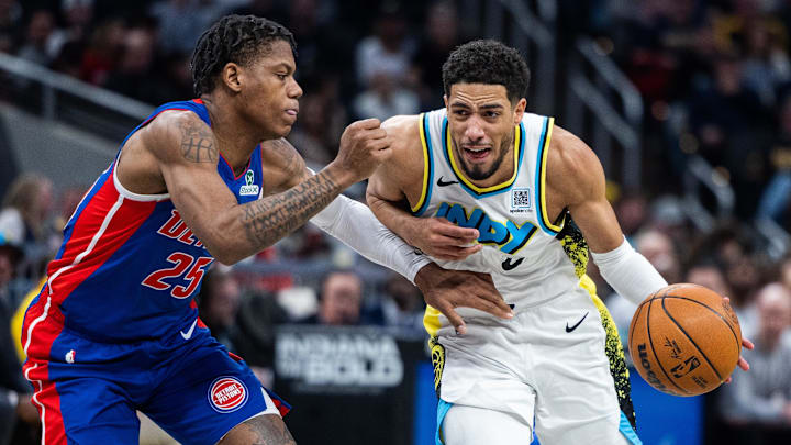 Jan 29, 2025; Indianapolis, Indiana, USA; Indiana Pacers guard Tyrese Haliburton (0) dribbles the ball while Detroit Pistons guard Marcus Sasser (25) defends in the first half at Gainbridge Fieldhouse. Mandatory Credit: Trevor Ruszkowski-Imagn Images Jan 29, 2025; Indianapolis, Indiana, USA; Indiana Pacers guard Tyrese Haliburton (0) dribbles the ball while Detroit Pistons guard Marcus Sasser (25) defends in the first half at Gainbridge Fieldhouse. Mandatory Credit: Trevor Ruszkowski-Imagn Images