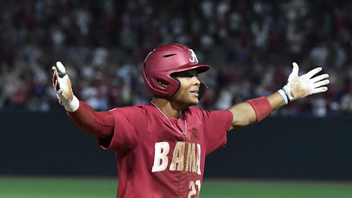 Alabama base runner Andrew Pinckney (21) celebrates after tripling to right in the top of the ninth at Sewell-Thomas Stadium in Tuscaloosa, Ala., Saturday June 4, 2023. Alabama defeated Troy 11-8 in the winners bracket game of the NCAA Regional Baseball Tournament.
