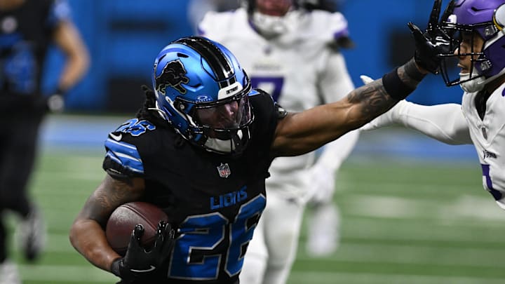 Detroit Lions running back Jahmyr Gibbs (26) runs the ball against the Minnesota Vikings in the fourth quarter at Ford Field. 