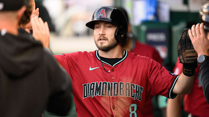 Apr 5, 2025; Washington, District of Columbia, USA; Arizona Diamondbacks outfielder Garrett Hampson (8) celebrates after scoring during the ninth inning against the Washington Nationals at Nationals Park. Mandatory Credit: Reggie Hildred-Imagn Images Apr 5, 2025; Washington, District of Columbia, USA; Arizona Diamondbacks outfielder Garrett Hampson (8) celebrates after scoring during the ninth inning against the Washington Nationals at Nationals Park. Mandatory Credit: Reggie Hildred-Imagn Images