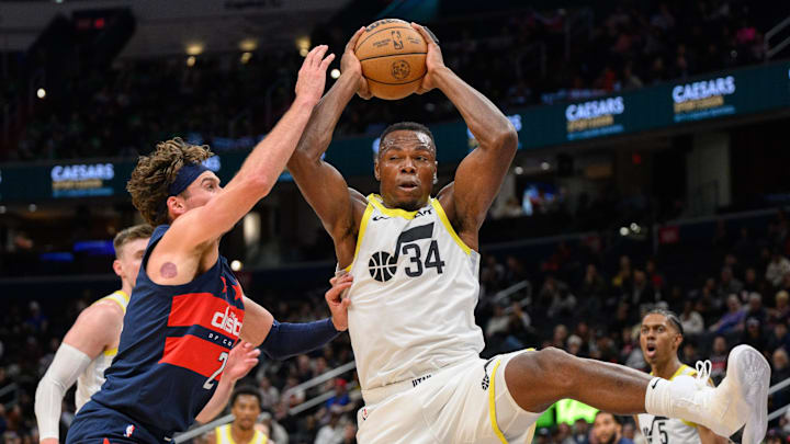 Mar 5, 2025; Washington, District of Columbia, USA; Utah Jazz center Oscar Tshiebwe (34) rebounds the ball against Washington Wizards forward Corey Kispert (24) during the fourth quarter at Capital One Arena. Mandatory Credit: Reggie Hildred-Imagn Images Mar 5, 2025; Washington, District of Columbia, USA; Utah Jazz center Oscar Tshiebwe (34) rebounds the ball against Washington Wizards forward Corey Kispert (24) during the fourth quarter at Capital One Arena. Mandatory Credit: Reggie Hildred-Imagn Images