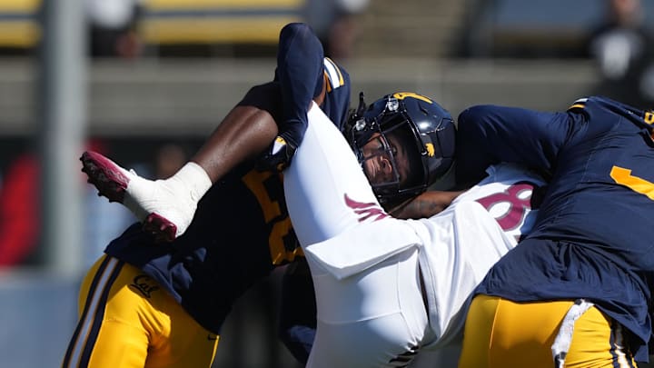 Cal defensive back Cam Sidney makes a tackle against Texas Southern