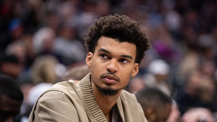Mar 7, 2025; Sacramento, California, USA; San Antonio Spurs center Victor Wembanyama (1) looks on from the bench during the fourth quarter of the game against the Sacramento Kings at Golden 1 Center. Mandatory Credit: Ed Szczepanski-Imagn Images