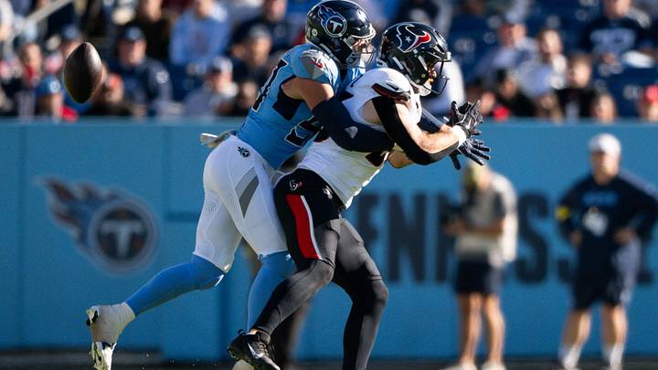 Nov 16, 2025; Nashville, Tennessee, USA; Tennessee Titans defensive lineman C.J. Ravenell (91) breaks up a pass thrown to Houston Texans tight end Dalton Schultz (86) during the first half at Nissan Stadium. Mandatory Credit: Steve Roberts-Imagn Images Nov 16, 2025; Nashville, Tennessee, USA; Tennessee Titans defensive lineman C.J. Ravenell (91) breaks up a pass thrown to Houston Texans tight end Dalton Schultz (86) during the first half at Nissan Stadium. Mandatory Credit: Steve Roberts-Imagn Images