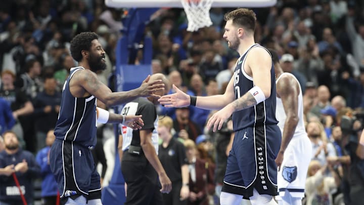 Dec 3, 2024; Dallas, Texas, USA; Dallas Mavericks guard Kyrie Irving (11) celebrates with Dallas Mavericks guard Luka Doncic (77) during the fourth quarter against the Memphis Grizzlies at American Airlines Center. Mandatory Credit: Kevin Jairaj-Imagn Images