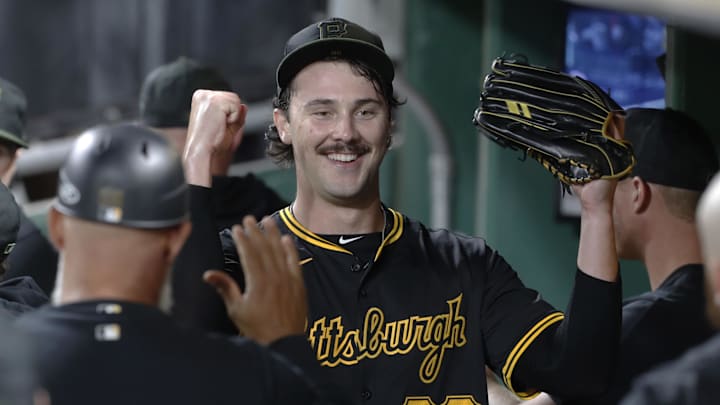 Sep 9, 2024; Pittsburgh, Pennsylvania, USA;  Pittsburgh Pirates starting pitcher Paul Skenes (30) reacts in the dugout after pitching the sixth inning against the Miami Marlins at PNC Park. Mandatory Credit: Charles LeClaire-Imagn Images