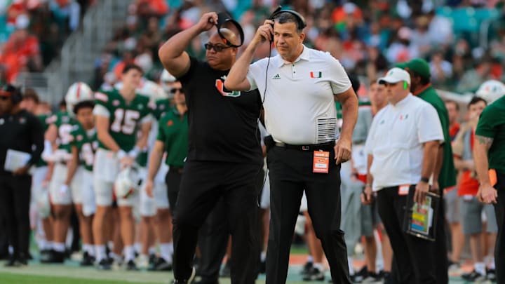 Nov 23, 2024; Miami Gardens, Florida, USA; Miami Hurricanes head coach Mario Cristobal look son from the sideline against the Wake Forest Demon Deacons during the second quarter at Hard Rock Stadium. Mandatory Credit: Sam Navarro-Imagn Images