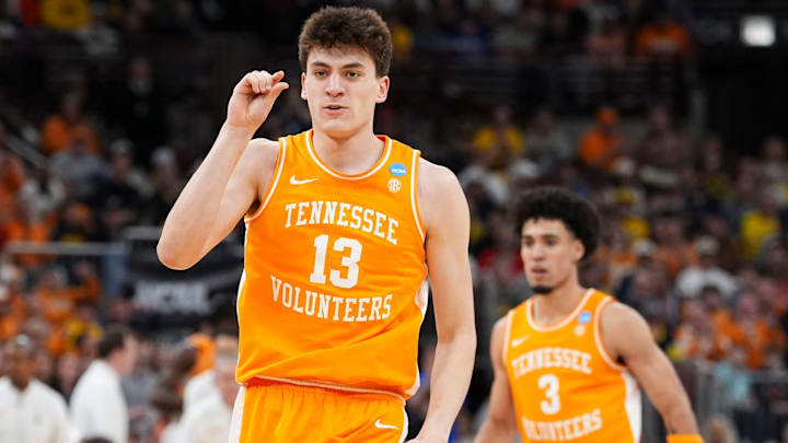 Tennessee forward J.P. Estrella (13) signals a close shot during the NCAA Tournament Elite 8 game against Michigan at the United Center in Chicago on March 29, 2026.
