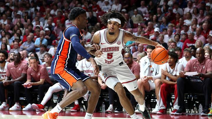 Mar 7, 2026; Tuscaloosa, Alabama, USA; Alabama Crimson Tide forward Amari Allen (5) dribbles against Auburn Tigers guard Kevin Overton (1) during the second half at Coleman Coliseum. Mandatory Credit: David Leong-Imagn Images Mar 7, 2026; Tuscaloosa, Alabama, USA; Alabama Crimson Tide forward Amari Allen (5) dribbles against Auburn Tigers guard Kevin Overton (1) during the second half at Coleman Coliseum. Mandatory Credit: David Leong-Imagn Images