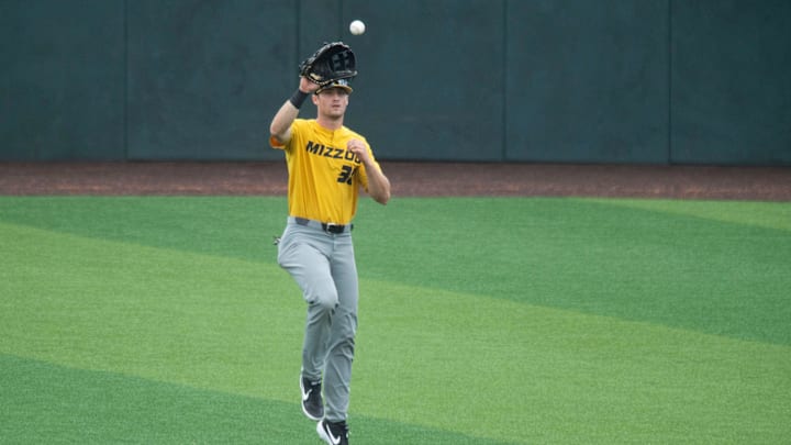 Missouris's Kameron Misner stops a hit to the outfield in the game against Tennessee at Lindsey Nelson Stadium on Sunday, May 5, 2019. 

Kns Vols Baseball Missouri