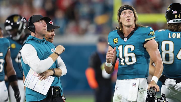 Oct 6, 2025; Jacksonville, Florida, USA; Jacksonville Jaguars head coach Liam Coen and quarterback Trevor Lawrence (16) during the first half against the Kansas City Chiefs at EverBank Stadium. Mandatory Credit: Morgan Tencza-Imagn Images