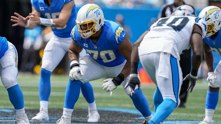 Sep 15, 2024; Charlotte, North Carolina, USA; Los Angeles Chargers offensive tackle Rashawn Slater (70) in his stance against the Carolina Panthers during the second quarter at Bank of America Stadium. Mandatory Credit: Jim Dedmon-Imagn Images Sep 15, 2024; Charlotte, North Carolina, USA; Los Angeles Chargers offensive tackle Rashawn Slater (70) in his stance against the Carolina Panthers during the second quarter at Bank of America Stadium. Mandatory Credit: Jim Dedmon-Imagn Images