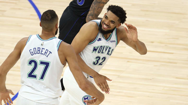 May 24, 2024; Minneapolis, Minnesota, USA; Minnesota Timberwolves center Karl-Anthony Towns (32) and center Rudy Gobert (27) react in the third quarter against the Dallas Mavericks during game two of the Western Conference Finals for the 2024 NBA Playoffs at Target Center. May 24, 2024; Minneapolis, Minnesota, USA; Minnesota Timberwolves center Karl-Anthony Towns (32) and center Rudy Gobert (27) react in the third quarter against the Dallas Mavericks during game two of the Western Conference Finals for the 2024 NBA Playoffs at Target Center.