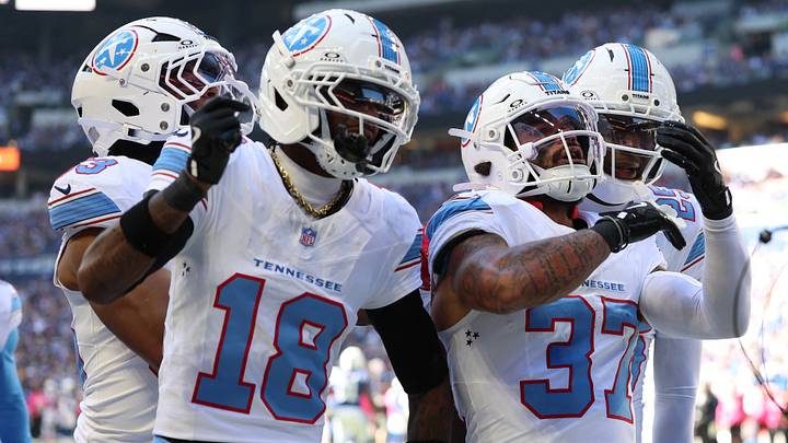 Oct 18, 2026; Indianapolis, Indiana, USA; Tennessee Titans safety Amani Hooker (37) reacts with teammates after catching an interception during the first half against the Indianapolis Colts at Lucas Oil Stadium. Mandatory Credit: Trevor Ruszkowski-Imagn Images Oct 18, 2026; Indianapolis, Indiana, USA; Tennessee Titans safety Amani Hooker (37) reacts with teammates after catching an interception during the first half against the Indianapolis Colts at Lucas Oil Stadium. Mandatory Credit: Trevor Ruszkowski-Imagn Images