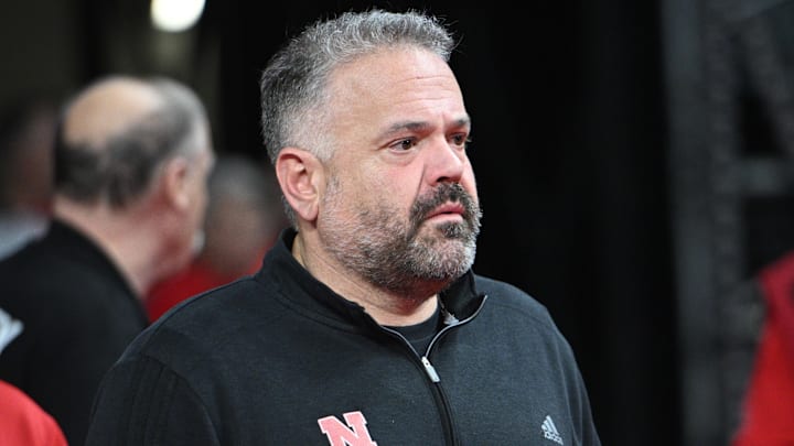 Mar 1, 2025; Lincoln, Nebraska, USA;  Nebraska Cornhuskers football coach Matt Rhule watches the game between the Nebraska Cornhuskers and the Minnesota Golden Gophers during the first half at Pinnacle Bank Arena. Mandatory Credit: Steven Branscombe-Imagn Images