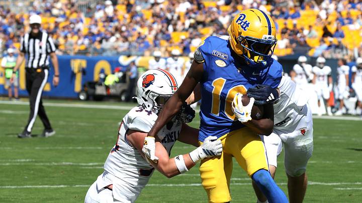 Sep 26, 2026; Pittsburgh, Pennsylvania, USA; Pittsburgh Panthers wide receiver Censere Lee (10) scores a touchdown against Bucknell Bison safety Darius Day (34) and safety Michael Bartasius (not pictured) during the second quarter at Acrisure Stadium. Mandatory Credit: Charles LeClaire-Imagn Images Sep 26, 2026; Pittsburgh, Pennsylvania, USA; Pittsburgh Panthers wide receiver Censere Lee (10) scores a touchdown against Bucknell Bison safety Darius Day (34) and safety Michael Bartasius (not pictured) during the second quarter at Acrisure Stadium. Mandatory Credit: Charles LeClaire-Imagn Images