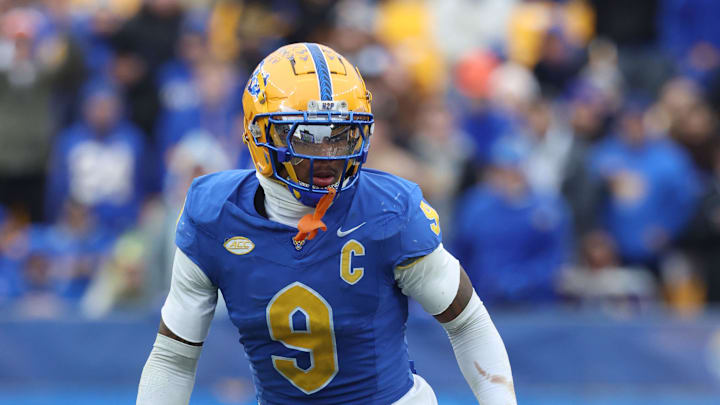 Nov 29, 2025; Pittsburgh, Pennsylvania, USA; Pittsburgh Panthers linebacker Kyle Louis (9) in pass action against the Miami Hurricanes during the third quarter at Acrisure Stadium. Mandatory Credit: Charles LeClaire-Imagn Images Nov 29, 2025; Pittsburgh, Pennsylvania, USA; Pittsburgh Panthers linebacker Kyle Louis (9) in pass action against the Miami Hurricanes during the third quarter at Acrisure Stadium. Mandatory Credit: Charles LeClaire-Imagn Images