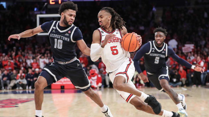 Mar 9, 2024; New York, New York, USA; St. John's Red Storm guard Daniss Jenkins (5) drives past Georgetown Hoyas guard Jayden Epps (10) in the second half at Madison Square Garden. Mandatory Credit: Wendell Cruz-USA TODAY Sports Mar 9, 2024; New York, New York, USA; St. John's Red Storm guard Daniss Jenkins (5) drives past Georgetown Hoyas guard Jayden Epps (10) in the second half at Madison Square Garden. Mandatory Credit: Wendell Cruz-USA TODAY Sports